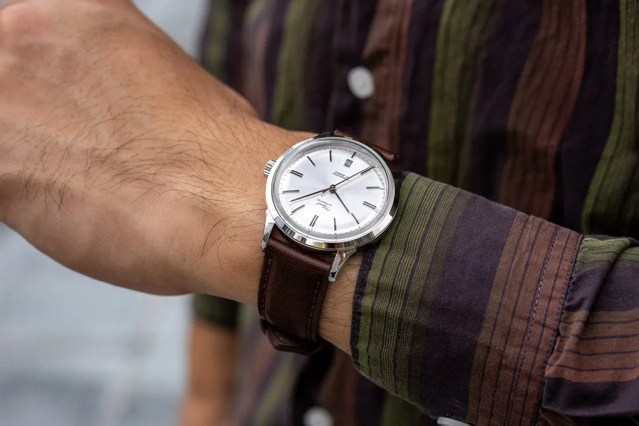 DWC - Silver domed sunray dial with applied silver indices and 6 o'clock date window (Miyota 8215 / 8315)